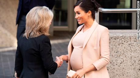 Meghan, Duchess of Sussex shakes hands with Rosi Prescott after visiting the National theatre in central London on January 30, 2019 after it was announced that she would be Patron of the theatre. (Photo by Niklas HALLEN / AFP)        (Photo credit should read NIKLAS HALLEN/AFP/Getty Images)