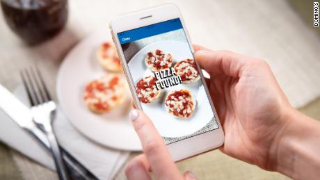 The new promotion lets customers earn a free Domino&#39;s pie when they eat pizza — even if they buy it from a competitor.  