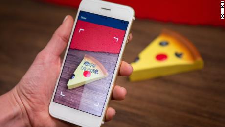 Domino&#39;s rewards customers for buying pizza -- even from its competitors 