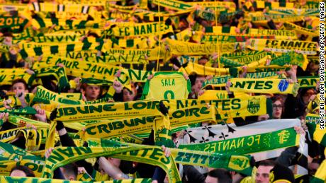 Nantes supporters hold up scarves during the Ligue 1 match.