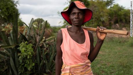 Tarisai Mubhoyi, 43, has been able to send her children to school and grow nutritional food to stay healthy.