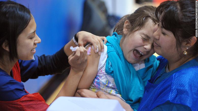 A student at Carlin Springs Elementary School receives an H1N1 flu vaccination