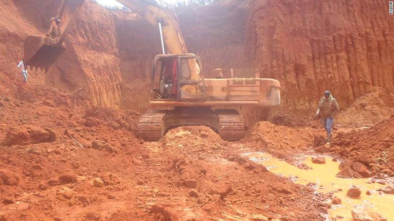 A Chinese mine site in Cameroon. Industrial machines are used to dig up the site.
