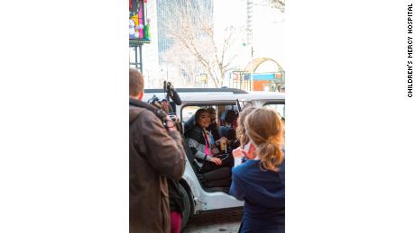 Zei Uwadia getting in the car with her mother on their way home from the hospital on Thursday.