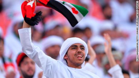 A UAE fan cheers during the semifinal between Qatar and UAE.