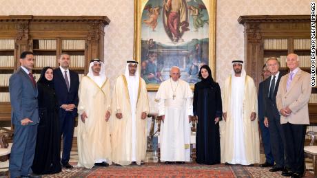 Pope Francis poses for a picture with the delegation of Crown Prince of Abu Dhabi Mohammed bin Zayed bin Sultan Al-Nahyan prior to a private audience at the Vatican on September 15, 2016.