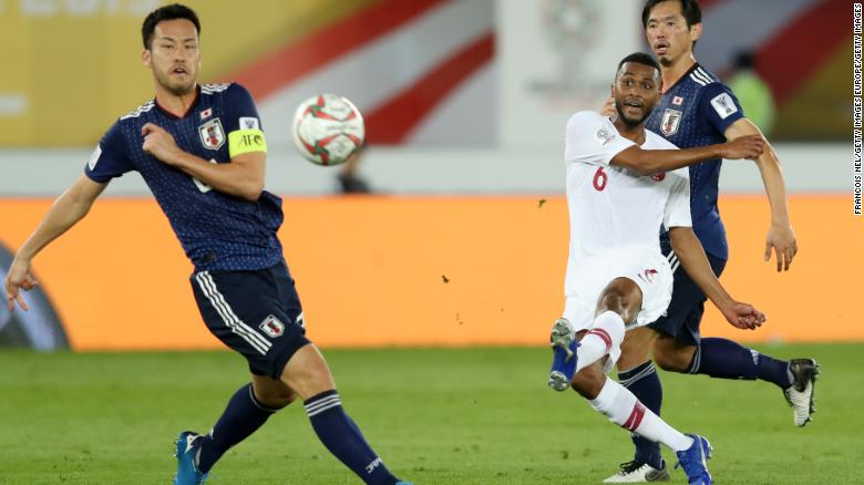Abdelaziz Hatim of Qatar scores his team&#39;s second goal against Japan.