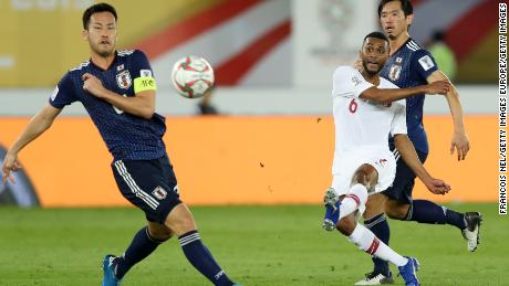 Abdelaziz Hatim of Qatar scores his team&#39;s second goal against Japan.