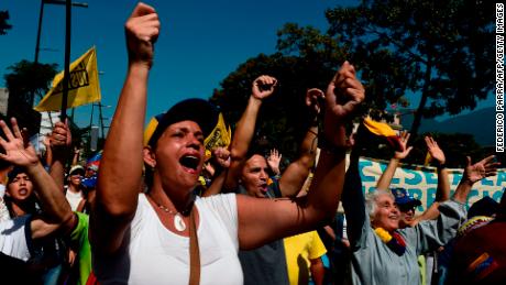 Protesters face off in dueling rallies in Venezuela's capital