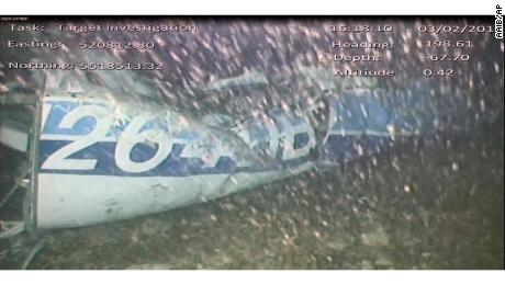 An image released Monday Feb. 4 by the UK Air Accidents Investigation Branch (AAIB) showing the rear left side of the fuselage including part of the aircraft registration N264DB