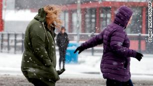 Seattle slips and slides through unusually heavy snowfall