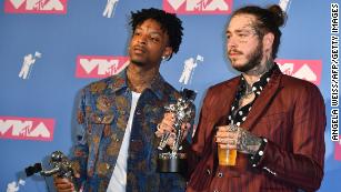 Grammys to take world stage Sunday, but 21 Savage will not 