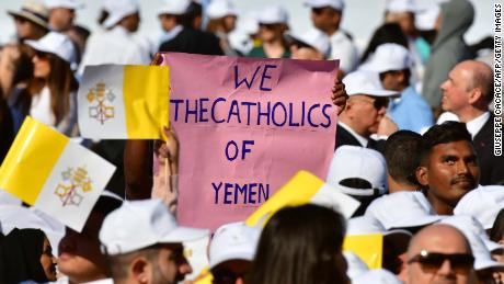 Christian worshippers attend a mass, led by Pope Francis, at the Zayed Sports City Stadium.