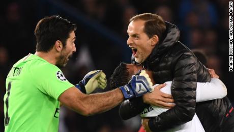 Gianluigi Buffon, Paris Saint-Germain's Brazilian defender Thiago Silva and coach Thomas Tuchel celebrate beating Liverpool.