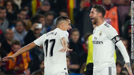 Lucas Vazquez and Sergio Ramos celebrate the opening goal.