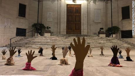 'Drowning hands' guerrilla artwork protests Italy's hard line on migrants