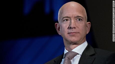 Amazon founder Jeff Bezos says National Enquirer publisher tried to extort him