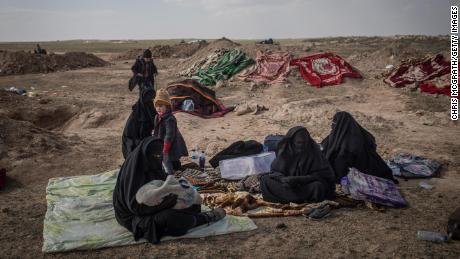 In the desert outside Baghouz Al-Fawqani, civilians are screened by the SDF.