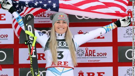 Vonn on the podium, celebrating winning bronze.