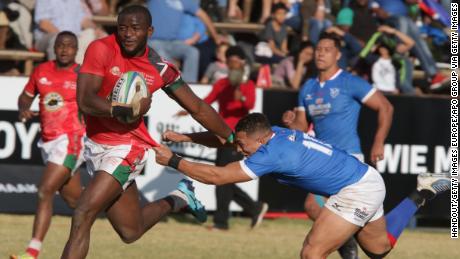 Kenya wing William Ambaka breaks past Namibia fly half Cliven Loubser during the Rugby World Cup qualifier between Namibia and Kenya.