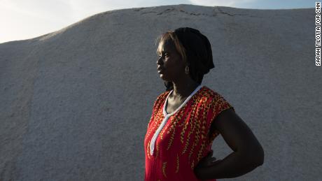 Small-business owner Marie Diouf, known as the &quot;queen of iodized salt,&quot; oversees the iodization process at her salt flat in Fatick, Senegal, on December 2, 2018.