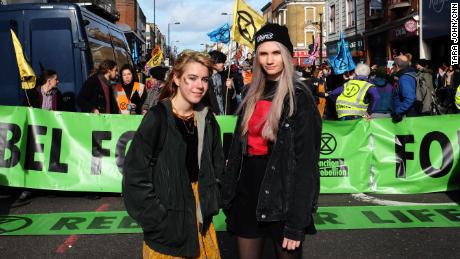 Anna Taylor, left, is trying to balance school with organizing a UK-wide student strike.