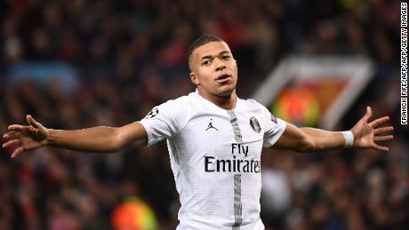 Paris Saint-Germain&#39;s French striker Kylian Mbappe celebrates scoring his team&#39;s second goal during the first leg of the UEFA Champions League round of 16 football match between Manchester United and Paris Saint-Germain (PSG) at Old Trafford in Manchester, north-west England on February 12, 2019. (Photo by FRANCK FIFE / AFP)        (Photo credit should read FRANCK FIFE/AFP/Getty Images)