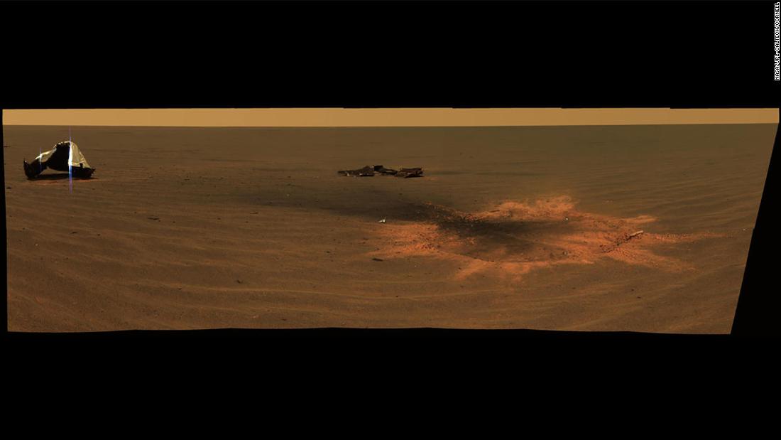 Opportunity made an impact. A panoramic image shows the heat shield impact site when it landed in 2004.