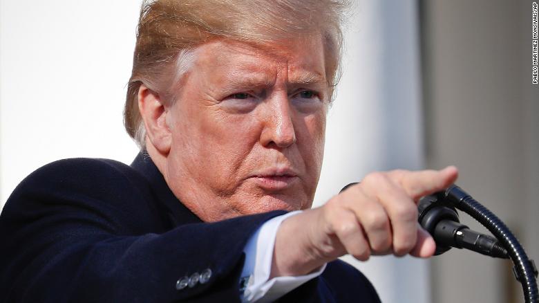 President Donald Trump points to a member of the media while taking questions after speaking during an event in the Rose Garden at the White House to declare a national emergency in order to build a wall along the southern border, Friday, Feb. 15, 2019 in Washington. (AP Photo/Pablo Martinez Monsivais)