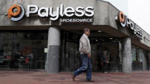 SAN FRANCISCO, CA - APRIL 05: A pedestrian walks by a Payless Shoe Source store on April 5, 2017 in San Francisco, California. Kansas-based discount shoe retailer Payless Shoe Source has filed for Chapter 11 bankruptcy and will close nearly 400 of its stores. (Photo by Justin Sullivan/Getty Images)