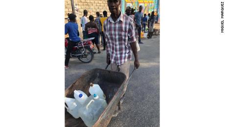 Haiti protesters take the day to gather food and water as they prepare for more possible conflict 