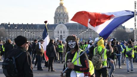 Protesters take part in the 14th consecutive weekend of marches in Paris on Saturday.