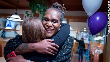 Andrea Jenkins hugs a supporter in 2017, upon winning a Minneapolis City Council seat. 