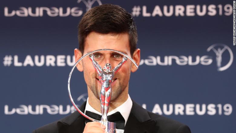 Laureus World Sportsman of The Year 2019 winner Serbia&#39;s tennis player Novak Djokovic poses with his award at the 2019 Laureus World Sports Awards ceremony at the Sporting Monte-Carlo complex in Monaco on February 18, 2019. (Photo by Valery HACHE / AFP)        (Photo credit should read VALERY HACHE/AFP/Getty Images)