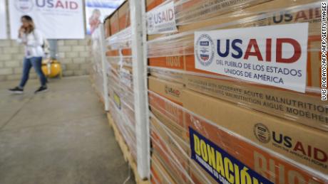 Boxes of aid ready for distribution sit inside a warehouse at the Tienditas International Bridge in Cucuta, Colombia, on Tuesday.