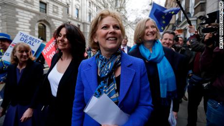 Ex-Conservative MPs Heidi Allen, second left, Anna Soubry, center, and Sarah Wollaston, right, arrive for a press conference in Westminster in London on Wednesday.  