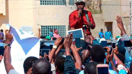 Ousmane Sonko delivering a speech to supporters. 