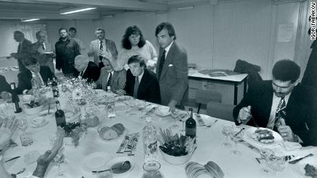 Donald Trump (seated, center) on his 1996 visit to Moscow. To his right are real estate moguls Bennett LeBow and Howard Lorber.