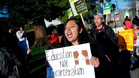 Roxana De La O Cortez marches with other teachers in Oakland. 