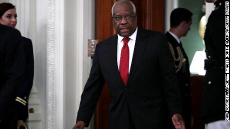 Clarence Thomas breaks silence on bench during Supreme Court&#39;s first remote oral argument 