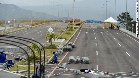 The Venezuelan government has used containers to barricade the Tienditas Bridge and prevent aid from entering.