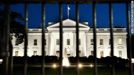 The White House is seen at dusk on the eve of a possible government shutdown as Congress battles out the budget in Washington, DC, September 30, 2013. AFP PHOTO / Saul LOEB (Photo credit should read SAUL LOEB/AFP/Getty Images)