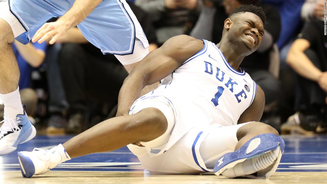 HUGE STORY
DURHAM, NORTH CAROLINA - FEBRUARY 20: (EDITORS NOTE: Retransmission with alternate crop.) Zion Williamson #1 of the Duke Blue Devils reacts after falling as his shoe breaks against Luke Maye #32 of the North Carolina Tar Heels during their game at Cameron Indoor Stadium on February 20, 2019 in Durham, North Carolina. (Photo by Streeter Lecka/Getty Images)