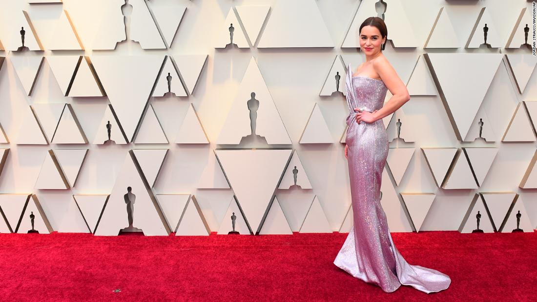 Award presenter Emilia Clarke wore a strapless, sparkly lilac gown custom-made by Balmain, while debuting a sleek new bob. 