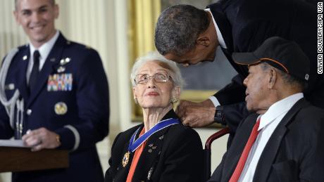 President Barack Obama gives the Presidential Medal of Freedom to Katherine Johnson in 2015.