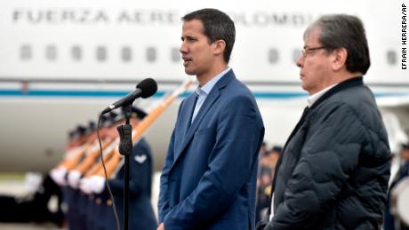 Juan Guaido with Colombian Foreign Minister Carlos Holmes Trujillo in Bogota Sunday.