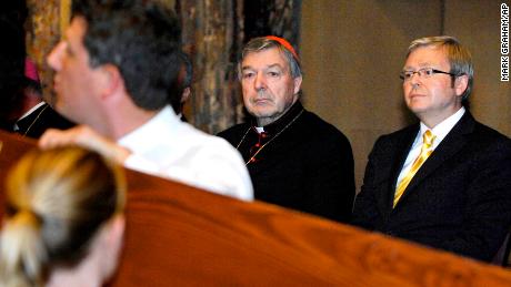 Australia's then-Prime Minister Kevin Rudd, right, and Cardinal Pell watch as the World Youth Day Cross and Icon enters the Great Hall of Parliament House in Canberra on February 18, 2008.