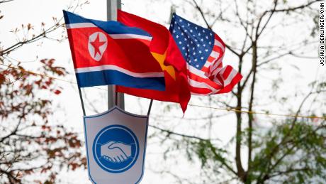 The flags of Vietnam, the United States and North Korea on display Sunday near Hoan Kiem Lake in Hanoi on Sunday.