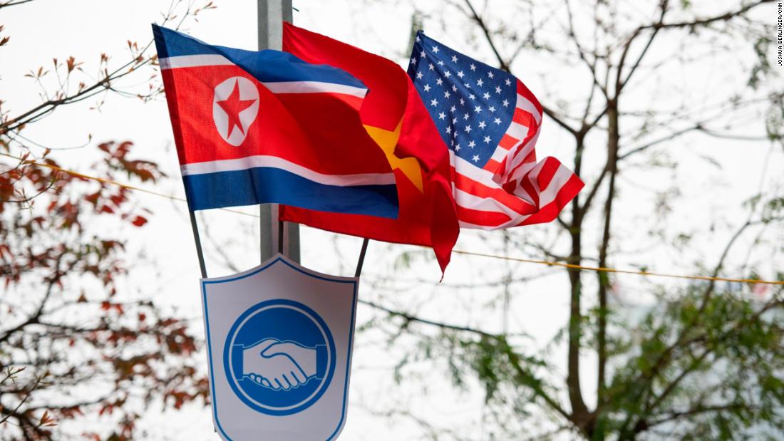 The flags of Vietnam, the United States and North Korea on display Sunday near Hoan Kiem Lake in Hanoi on Sunday.