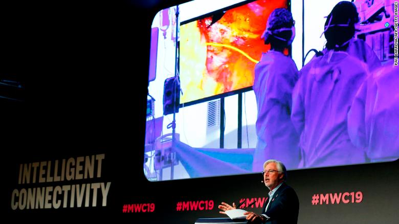 Doctor Antonio Lacy of Hospital Clinic de Barcelona delivers a speech about the first 5G tele-mentored live surgery at the Mobile World Congress (MWC) in Barcelona on February 27, 2019. - Phone makers will focus on foldable screens and the introduction of blazing fast 5G wireless networks at the world's biggest mobile fair as they try to reverse a decline in sales of smartphones. (Photo by Pau Barrena / AFP)        (Photo credit should read PAU BARRENA/AFP/Getty Images)